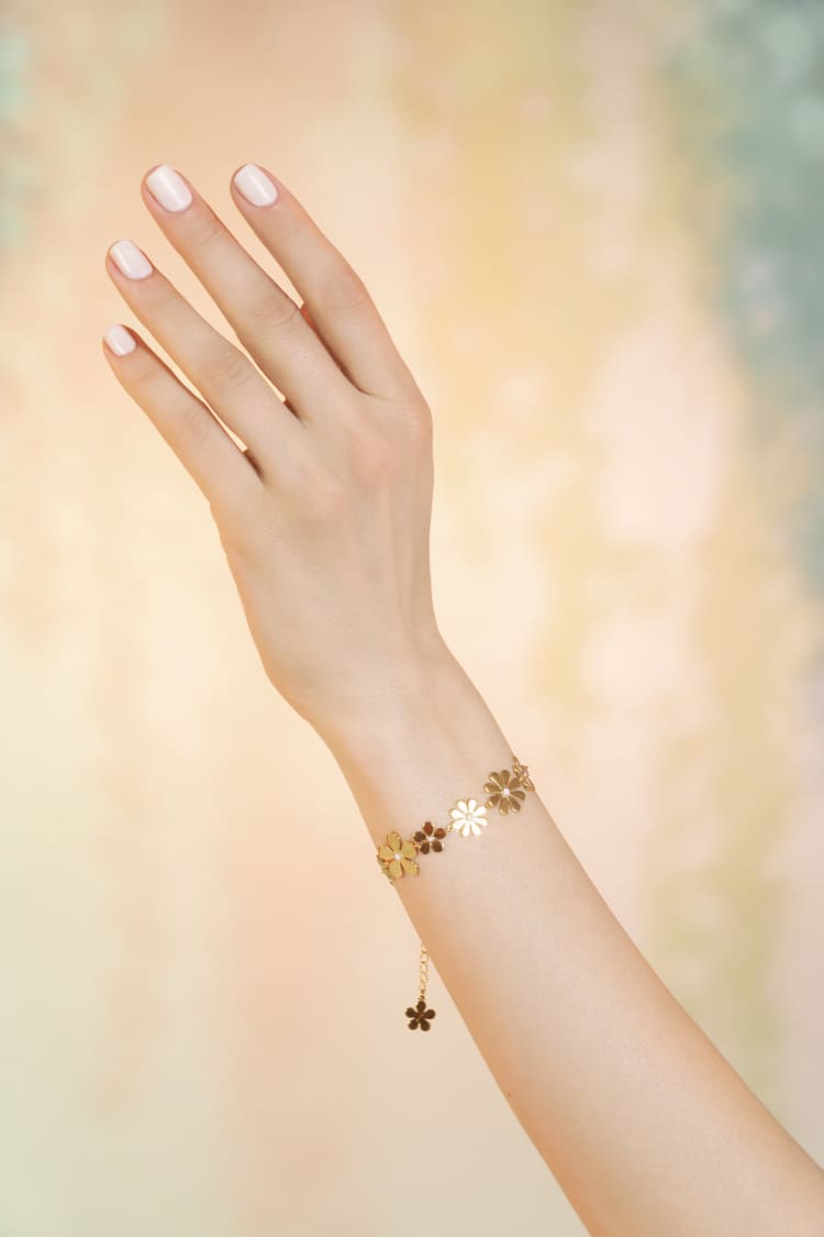Goldenes Blumenarmband