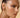 Goldener Ear Cuff mit drapierter Kette