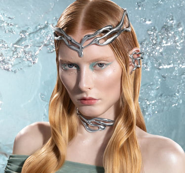 krone mit organischer form aus silber