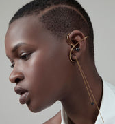 Gold ear cuff with earrings and sandal stone